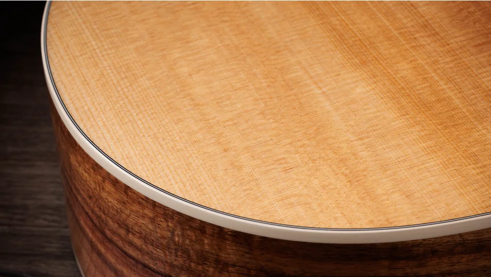 214ce-K DLX Hawaiian Koa Acoustic-Electric Guitar | Taylor Guitars